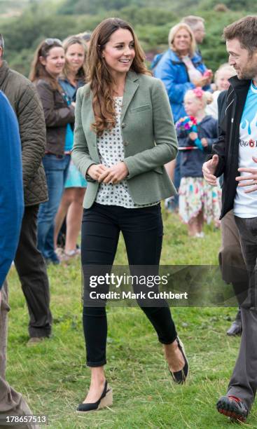 Catherine, Duchess of Cambridge starts The Ring O'Fire Anglesey Coastal Ultra Marathon on August 30, 2013 in Holyhead, Wales.