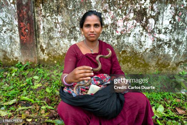 a gypsy healer from bangladesh shows her healing horn with which she will heal her patient - bangladeshi culture stock pictures, royalty-free photos & images