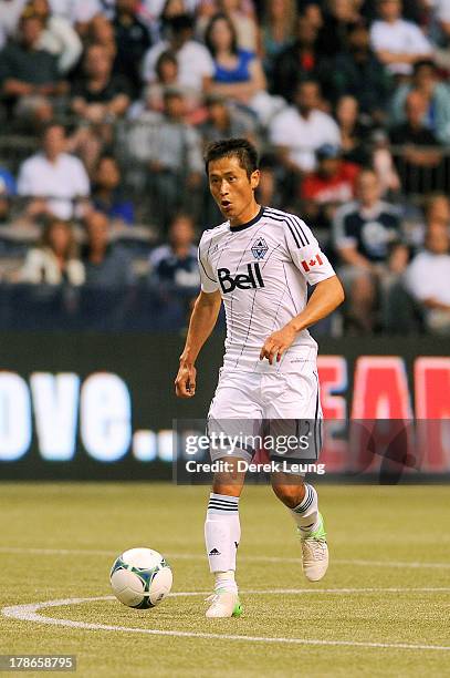 Young-Pyo Lee of the Vancouver Whitecaps in action during an MLS match against the Los Angeles Galaxy at B.C. Place on August 24, 2013 in Vancouver,...