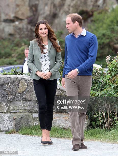 Catherine, Duchess of Cambridge and Prince William, Duke of Cambridge attend the start of The Ring O'Fire Anglesey Coastal Ultra Marathon on August...
