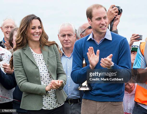 Catherine, Duchess of Cambridge and Prince William, Duke of Cambridge start The Ring O'Fire Anglesey Coastal Ultra Marathon on August 30, 2013 in...