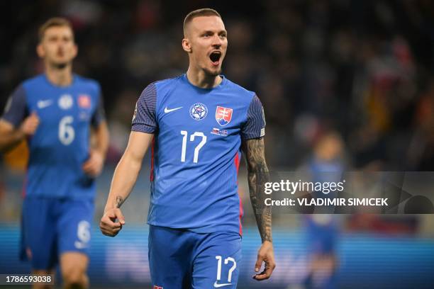 Slovakia's midfielder Lukas Haraslin celebrates scoring during the Euro 2024 football tournament group J first round qualifying match between...