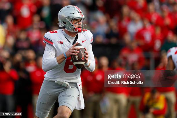 Quarterback Kyle McCord of the Ohio State Buckeyes in action against the Rutgers Scarlet Knights during a college football game at SHI Stadium on...