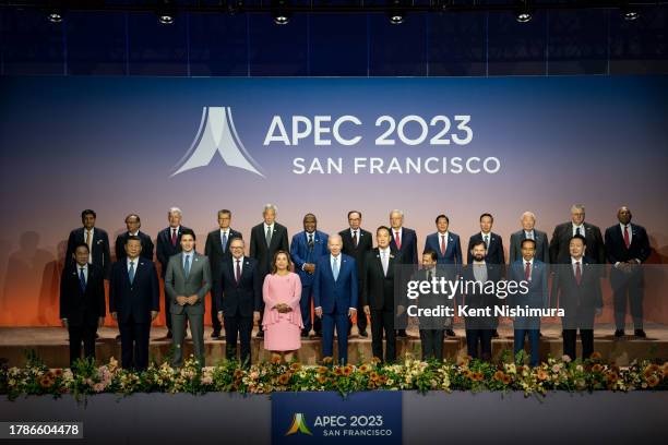 World leaders, including President Joe Biden, front center, stand for a family photo during the Asia-Pacific Economic Cooperation Leaders' Week at...