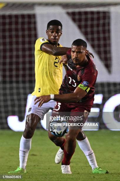 Ecuador's defender Felix Torres and Venezuela's forward Salomon Rondon fight for the ball during the 2026 FIFA World Cup South American qualification...