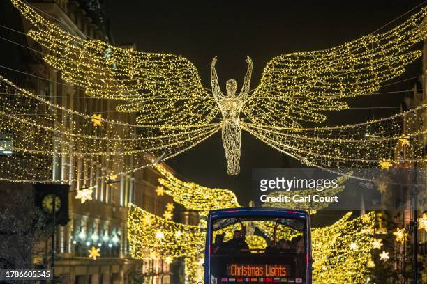 Christmas lights are displayed along Regent Street on November 16, 2023 in London, England. Oxford Street took the lead in the seasonal light display...