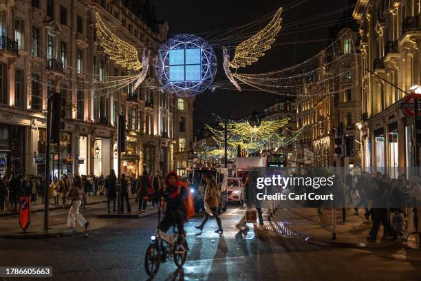 Christmas lights are displayed along Regent Street on November 16, 2023 in London, England. Oxford Street took the lead in the seasonal light display...