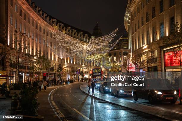 Christmas lights are displayed along Regent Street on November 16, 2023 in London, England. Oxford Street took the lead in the seasonal light display...