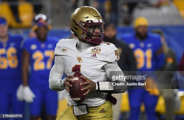 Thomas Castellanos of the Boston College Eagles drops back to pass in the first half during the game against the Pittsburgh Panthers at Acrisure...