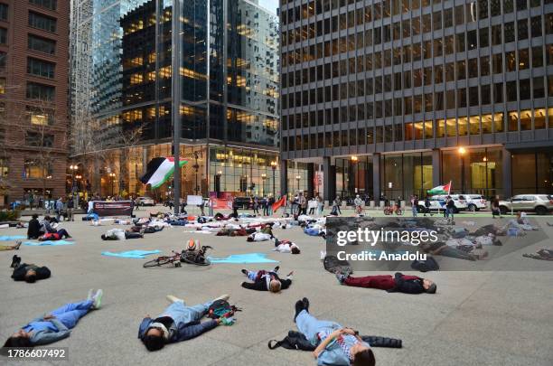 Pro-Palestinian demonstrators from healthcare workers gather to demonstrate against Israeli airstrike on hospitals in front of Federal Plaza in...