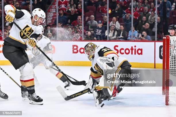 Goaltender Adin Hill of the Vegas Golden Knights gets the skate out to make a save during the second period against the Montreal Canadiens at the...