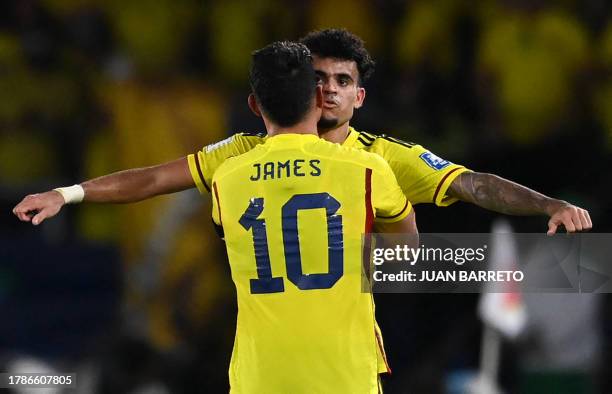 Colombia's forward Luis Diaz celebrates with Colombia's midfielder James Rodriguez after scoring during the 2026 FIFA World Cup South American...