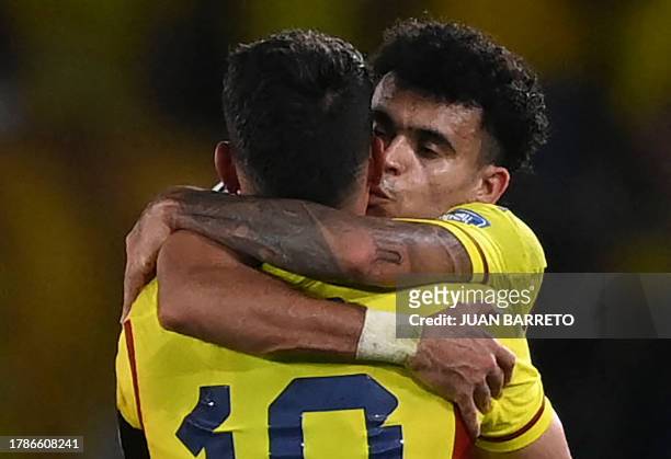 Colombia's forward Luis Diaz celebrates with midfielder James Rodriguez after scoring during the 2026 FIFA World Cup South American qualification...