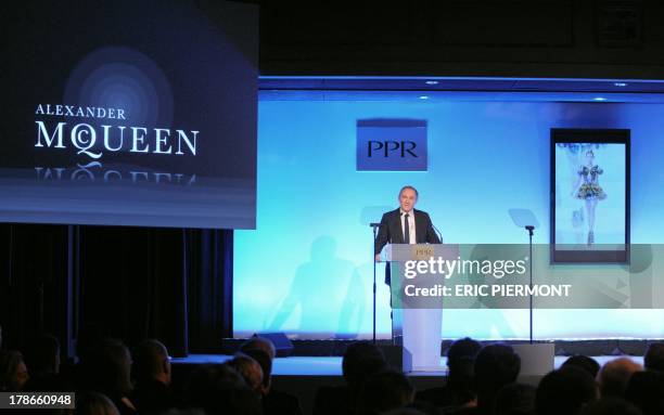 French luxury goods group PPR chief executive Francois-Henri Pinault pays homage to British designer Alexander McQueen on February 18, 2010 during a...