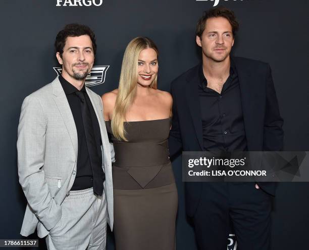 Film producer Josey McNamara, Australian actress Margot Robbie and English film producer and actor Tom Ackerley arrive for Variety's Power of Women...