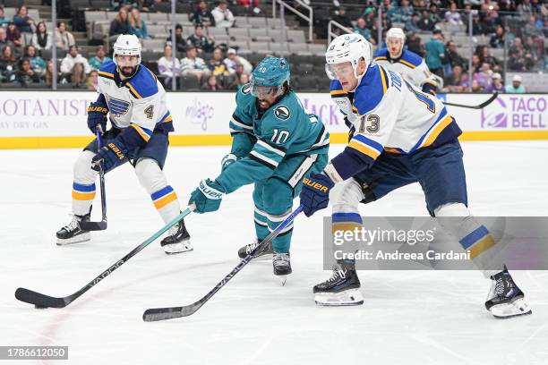 November 16: Anthony Duclair of the San Jose Sharks skating with the puck against the St. Louis Blues at SAP Center on November 16, 2023 in San Jose,...