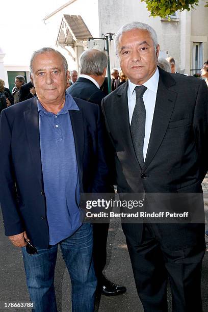 Daniel Hechter and Francois Ben Naceur attend President of FIFA protocol Doctor Pierre Huth Funeral in Nogent Sur Marne cemetery on August 30, 2013...