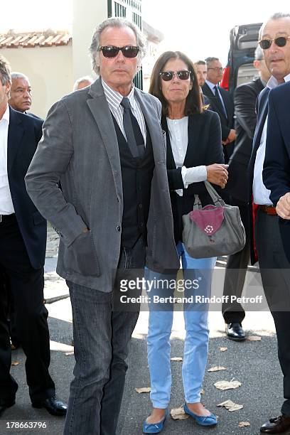 Humorist Michel Leeb with his wife Beatrice attend President of FIFA protocol Doctor Pierre Huth Funeral in Nogent Sur Marne cemetery on August 30,...