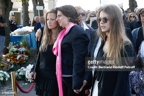 Daughter of Pierre Huth, Nathalie Huth-Guizol with her daughters Alice and Claire Guizol attend President of FIFA protocol Doctor Pierre Huth Funeral...