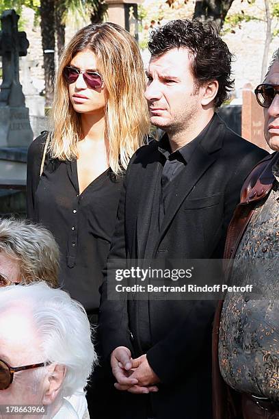 Michael Youn and his wife Isabelle Funaro attend President of FIFA protocol Doctor Pierre Huth Funeral in Nogent Sur Marne cemetery on August 30,...