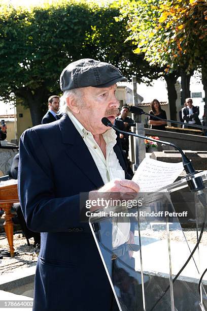 Humorist Popeck Honors President of FIFA protocol Doctor Pierre Huth whyle his Funeral in Nogent Sur Marne cemetery on August 30, 2013 in...