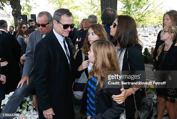 Francis Huster and Cristiana Reali with their daughters Toscane and Elisa attend President of FIFA protocol Doctor Pierre Huth's Funeral in Nogent...