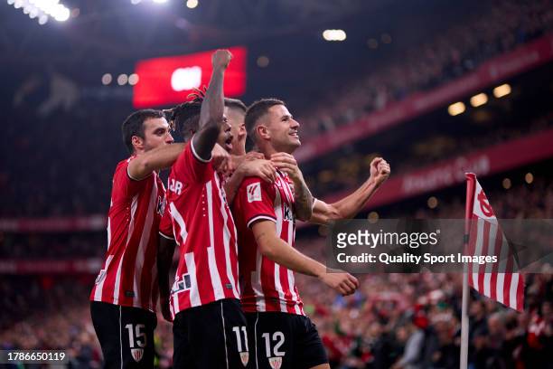 Gorka Guruzeta of Athletic Club celebrates with his teammates after scoring his team's third goal during the LaLiga EA Sports match between Athletic...