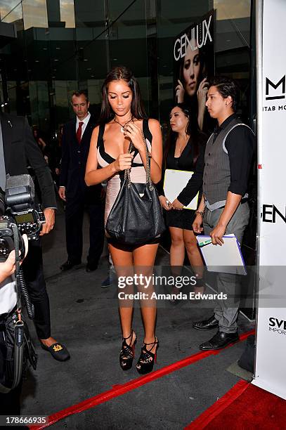 Model and television personality Nabilla Benattia arrives at the Genlux Magazine release party with Erika Christensen at Sofitel Hotel on August 29,...