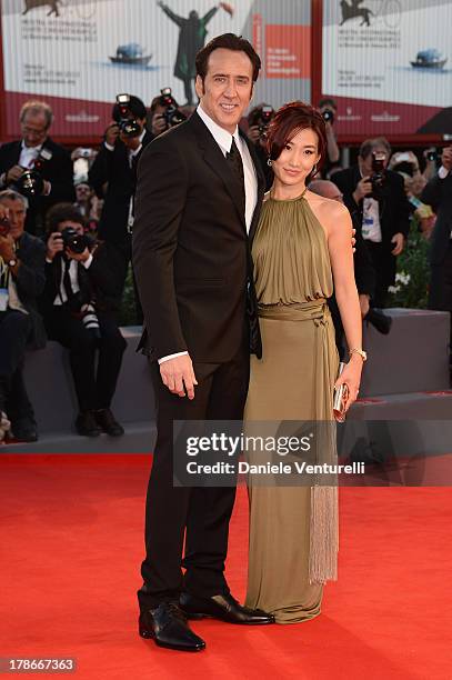 Actor Nicolas Cage and his wife Alice Kim attend "Joe" Premiere during The 70th Venice International Film Festival at Sala Grande on August 30, 2013...