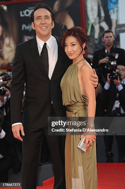 Actor Nicolas Cage and his wife Alice Kim attend "Joe" Premiere during The 70th Venice International Film Festival at Sala Grande on August 30, 2013...