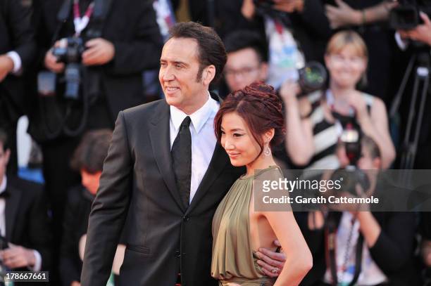 Actor Nicolas Cage and his wife Alice Kim Cage attend the 'Joe' Premiere during The 70th Venice International Film Festival at Palazzo Del Cinema on...