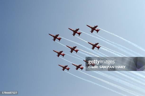 Indian Air Force Surya Kiran aircrafts perform an aerobatic display over the Narendra Modi Stadium in Ahmedabad on November 17 during a rehearsal...