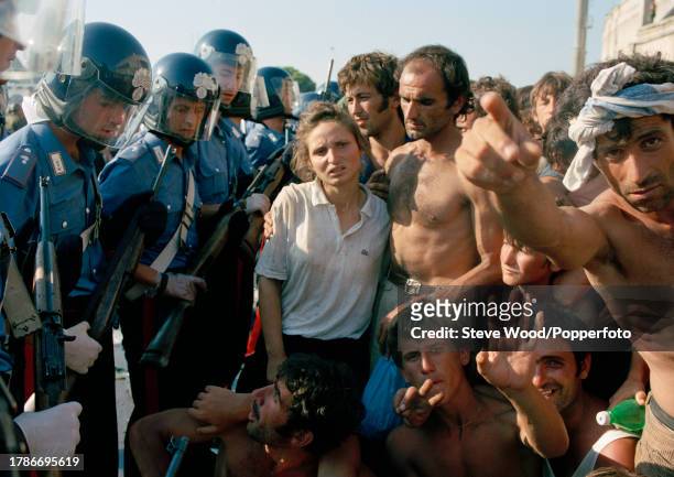 Albanian migrants at the port in the italian city of Bari, where they arrived in their thousands on the ship Vlora after fleeing political and social...