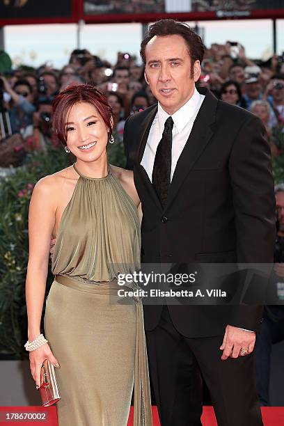 Actor Nicolas Cage and his wife Alice Kim attend 'Joe' Premiere during The 70th Venice International Film Festival at Sala Grande on August 30, 2013...