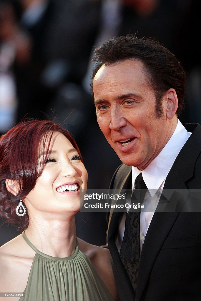 Kim Cage Riley Actor Nicolas Cage and his wife Alice Kim Cage attend the 'Joe'... News ...
