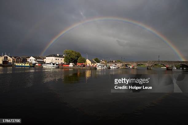 rainbow above bridge over shannon river - county leitrim stock pictures, royalty-free photos & images