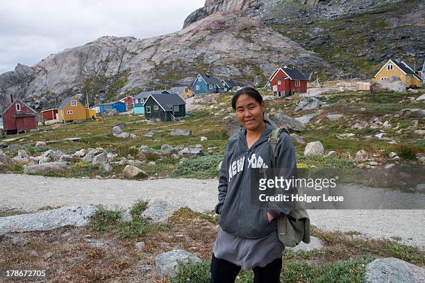 girl with new york sweatshirt in village - prince christian sound greenland stock pictures, royalty-free photos & images
