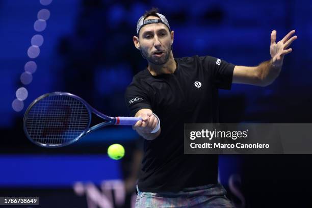 Santiago Gonzalez of Mexico in action during the Round Robin doubles match between Ivan Dodig of Croatia and Austin Krajicek of USA against Santiago...