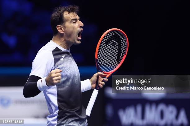 Ivan Dodig of Croatia celebrate during the Round Robin doubles match between Ivan Dodig of Croatia and Austin Krajicek of USA against Santiago...