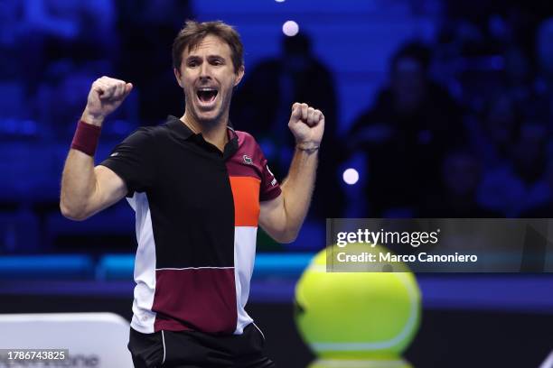 Edouard Roger-Vasselin of France celebrates at the end of the Round Robin doubles match between Ivan Dodig of Croatia and Austin Krajicek of USA...