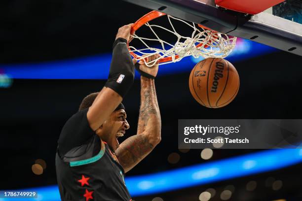 Daniel Gafford of the Washington Wizards dunks the ball against the Charlotte Hornets during the first half at Capital One Arena on November 10, 2023...