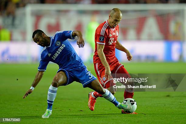 Ashley Cole of Chelsea and Arjen Robben of Bayern Munich battle for the ball during the UEFA Super Cup between Bayern Muenchen and Chelsea at Stadion...