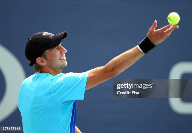 Jarkko Nieminen of Finland serves during his men's singles second round match against Joao Souza of Brazil on Day Five of the 2013 US Open at USTA...