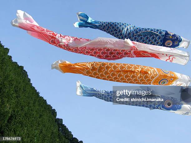 carp streamers - koinobori stock pictures, royalty-free photos & images