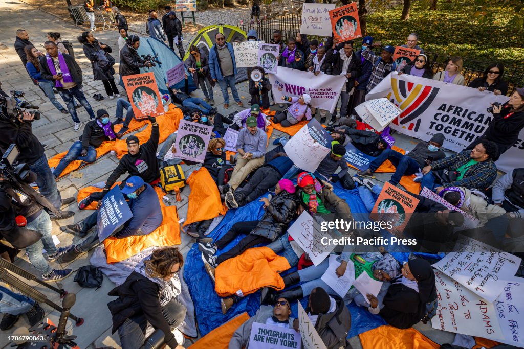 Protest Or Rally Protesters lay on the ground chanting during a rally and