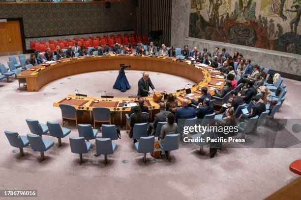 Member of Security Council secretariat collects ballots during secret vote on election of five members of the International Court of Justice at UN...