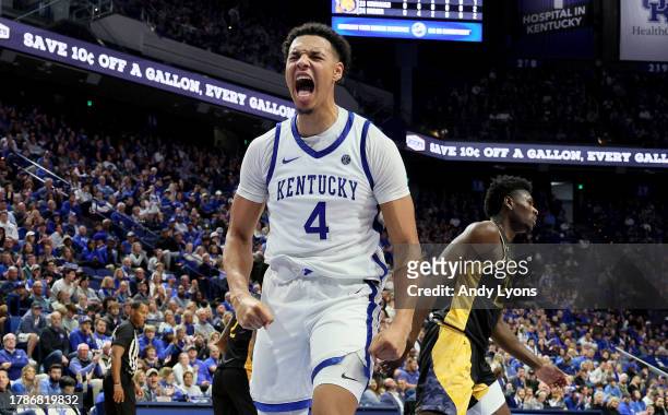 Tre Mitchell of the Kentucky Wildcats celebrates after scoring against the Texas A&M-Commerce at Rupp Arena on November 10, 2023 in Lexington,...