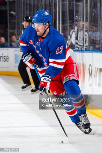 Alexis Lafreniere of the New York Rangers skates with the puck against the Detroit Red Wings at Madison Square Garden on November 7, 2023 in New York...