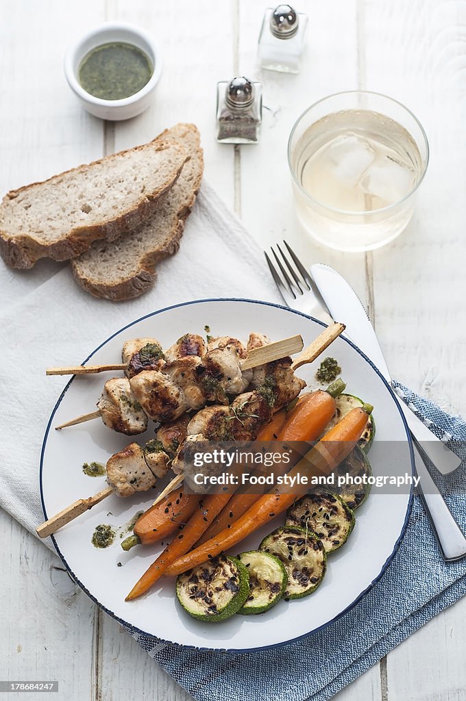 Grilled chicken meat with glazed carrots