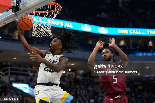 Sean Jones of the Marquette Golden Eagles shoots the ball against Mervin James of the Rider Broncs in the first half at Fiserv Forum on November 10,...